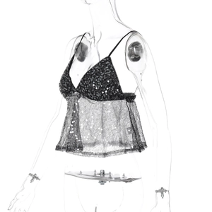 Detail eines schwarzen Pailletten-Tops mit transparentem Spitzenrand auf Schneiderpuppe