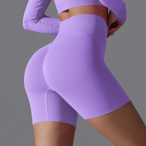 Detail view of seamless high waist yoga shorts in light purple with booty lifting scrunch