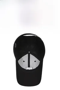 Detail view of cotton baseball cap inner lining with metal buckle and stitch quality