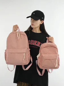 Pink corduroy backpack set for students featuring large capacity and soft fabric texture