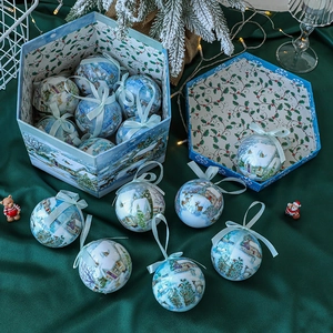 Blue and white Christmas ornament set with snow scenes in a hexagonal gift box