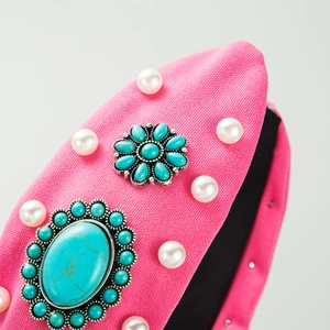 Pink bohemian fabric knotted headband with pearls and turquoise stones in a retro style