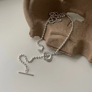 Minimalist 925 sterling silver beaded necklace with irregular pendant and T-bar toggle clasp