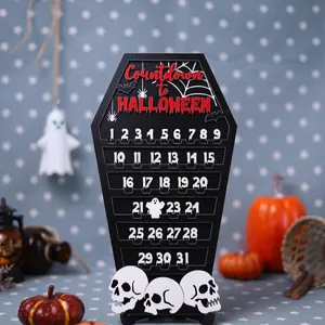 Macro view of wooden coffin Halloween countdown calendar with skull base and ghost motif