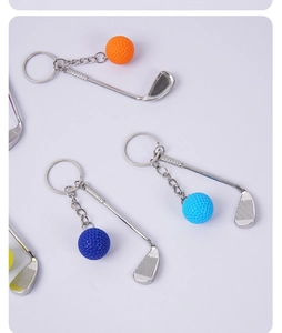 Detailed top view of mini golf club and ball keychains in various vibrant colors