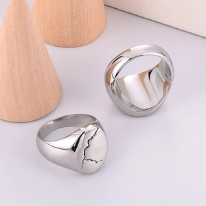 Men's minimalist silver stainless steel wide ring featuring distressed crackle texture