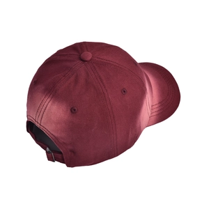Detail view of tie-dye baseball cap with metal buckle closure and cotton texture