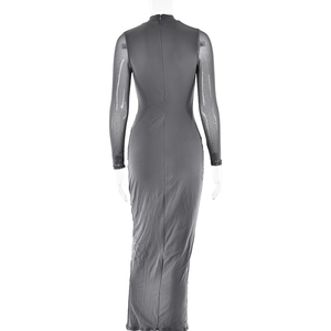 Detail view of dark grey slim fit maxi dress featuring sheer mesh sleeves and back zipper