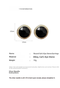 Detail showing 1.5cm round cat's eye stone earrings with silver needles and vintage alloy frame