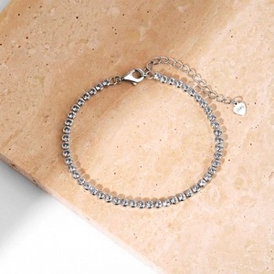 Close-up of S925 sterling silver tennis bracelet with 2mm zircons and lobster clasp detail