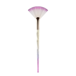 Close-up of fan highlighter brush with rose gold ferrule and crystal glitter handle