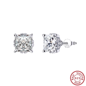 Macro shot of S925 sterling silver square cut studs with clear cubic zirconia in 4-prong setting