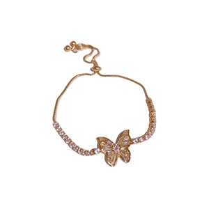 Elegant gold butterfly bracelet with white zircon stones and adjustable drawstring chain
