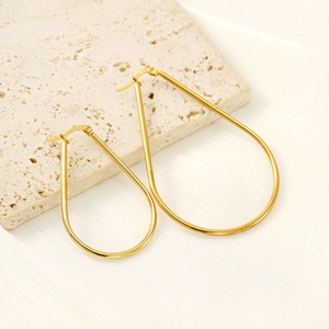 Minimalist golden teardrop hoop earrings in polished stainless steel for women