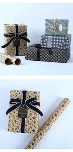 Detail of vintage kraft paper gift wrap featuring blue nautical and grid patterns