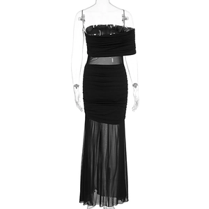 Close-up of black strapless evening dress with sheer mesh panels and pleated details