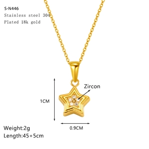 Macro view of gold-plated star pendant featuring dimensions and cubic zirconia detail