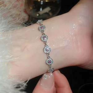 Elegant 18K gold plated bracelet featuring sparkling round zircon links on wrist