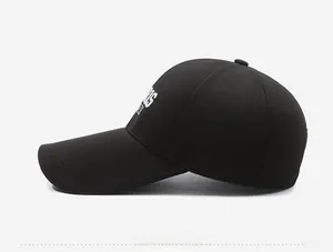 Detail view of the side profile on a black cotton baseball cap with white PARIS embroidery