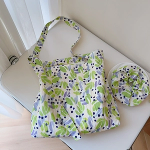 Floral cotton tote bag and matching scrunchie with green leaf pattern and snap button