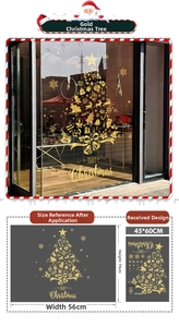 Detail of golden static Christmas tree window sticker with Merry Christmas typography