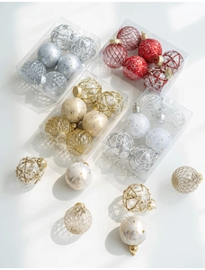 Close-up of assorted PET painted Christmas balls with hollow mesh and star patterns