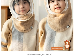 Detail of kids winter fleece hooded scarf with integrated clear face mask in beige and brown