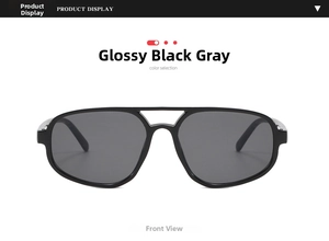 Detail of modern double bridge sunglasses with shiny black frames and grey lenses