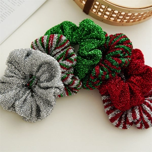 Glittering Christmas scrunchies set in festive silver, green and burgundy shiny fabric