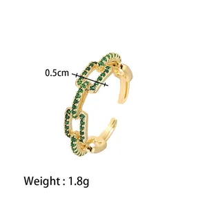 Adjustable gold plated stainless steel chain ring with green zircons, width 0.5cm, 1.8g