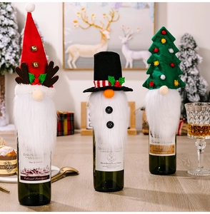 Detailed plush Christmas wine bottle covers featuring reindeer antlers and gnome beard decor