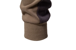 Detailed macro view of stitched ribbed cuffs on a cotton patchwork sports sweatshirt