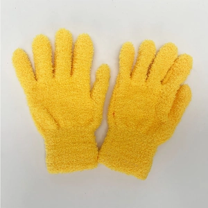 Close-up of thick yellow coral fleece gloves showing the fuzzy winter thermal texture