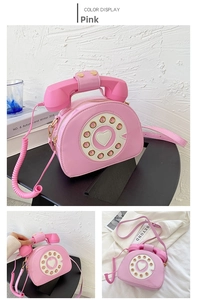 Detail of pink patent leather handbag featuring a creative vintage rotary phone design