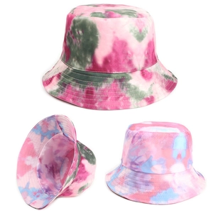 Detail showing inner stitching and colorful tie-dye patterns on reversible bucket hats