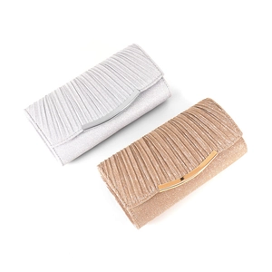 Elegant gold and silver pleated clutch bags with metallic trim for formal evening events