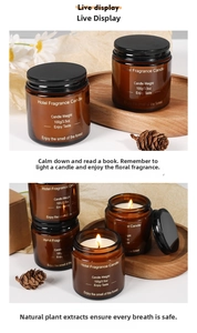 Detail view of 100g amber glass scented candle with black metal lid and forest fragrance