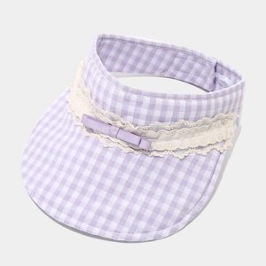 Close-up of lavender plaid sun visor with delicate lace embroidery and ribbon bow