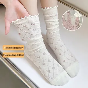 Breathable white cotton mesh socks with heart patterns and ruffled edges for women