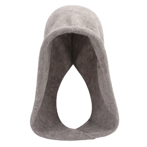 Close-up of light grey knitted balaclava scarf with premium soft wool texture
