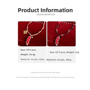 Detail of red pea-pod necklaces with gold accents and beaded cords on velvet
