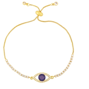 Macro detail of evil eye bracelet with purple zircon and adjustable gold sliding clasp