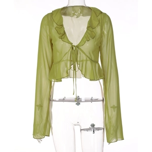 Detail of green sheer chiffon top with ruffle trim, V-neckline and tie-front closure