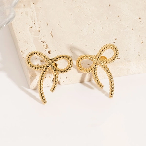 Detailed view of gold 18K plated stainless steel twisted rope butterfly earrings