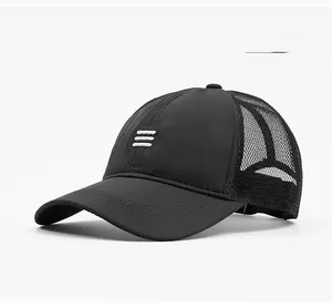 Detail of dark grey mesh baseball cap with breathable stitching and adjustable buckle strap