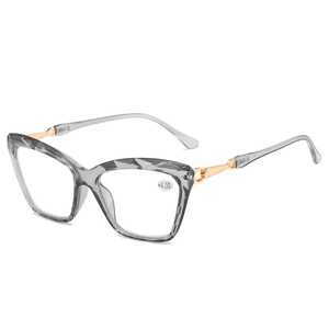 Cat-Eye-Lesebrille mit grauem transparentem Rahmen und goldenen Metallbügeln, Stärke +4,00