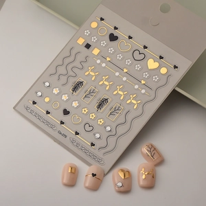 Detailed view of 5D gold heart nail stickers with irregular lines and pattern Co-275