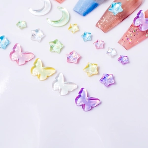 Aurora mocha K9 glass nail art rhinestones with butterfly and moon shapes on long nails