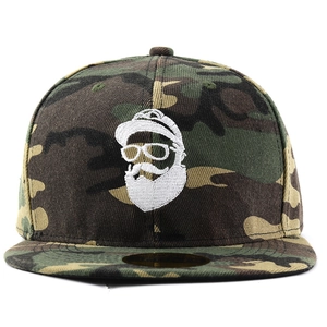 Detail of camouflage snapback cap featuring white beard man embroidery and gold sticker