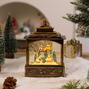Close-up of vintage bronze Christmas lantern with Santa, elk, and golden glitter snow